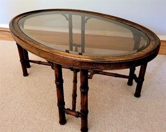 Oval bamboo motif cocktail table $65. #22