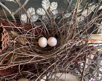  We set up the back porch on Tues and came back on Thursday to find a Dove had built a nest in a fall floral arrangement and laid 2 eggs. So for now the floral arrangement is not for sale.