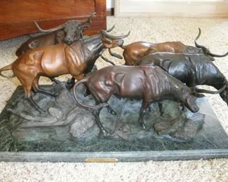 BRONZE REMINGTON TITLED CATTLE DRIFTING BEFORE THE STORM