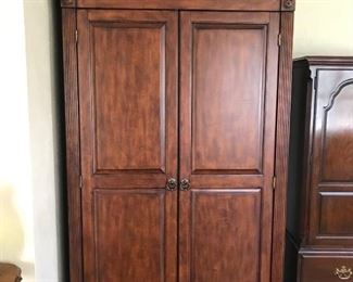 Large armoire, 45" x 22" x 88", drawers, shelving and optional hanging bar. 