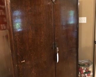 Armoire with mirror inside