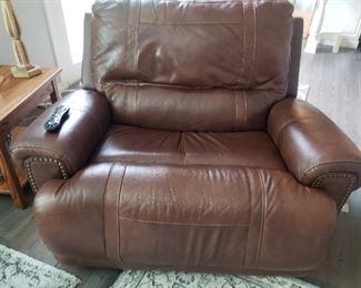 Comfortable oversized brown leather power recliner 