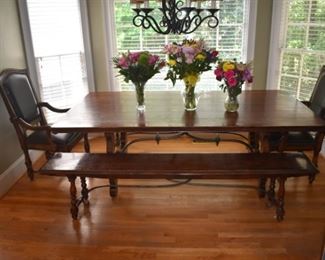 Awesome solid wood table with two benches and two captains chairs - very stylish and ready for a long life with your family.