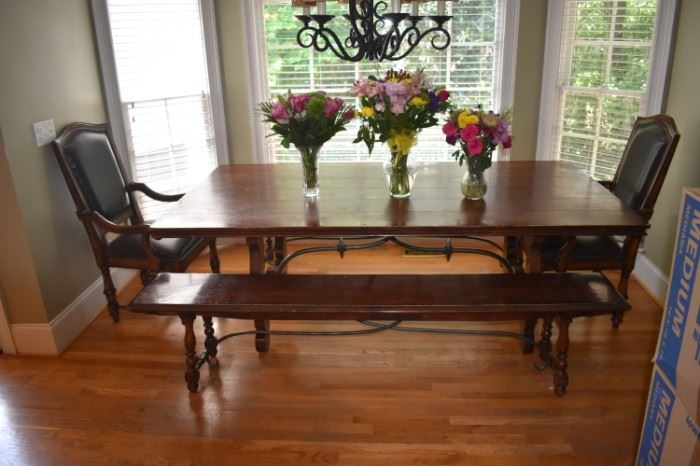 Awesome solid wood table with two benches and two captains chairs - very stylish and ready for a long life with your family.