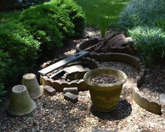 Clay and ceramic flower pots and landscaping materials