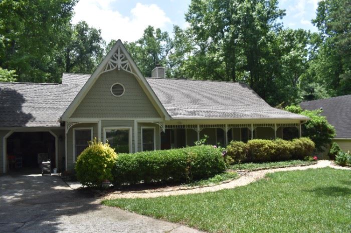 Magnificent Dunwoody home with lots of fine furnishings and accessories and plants, outdoor items and tools