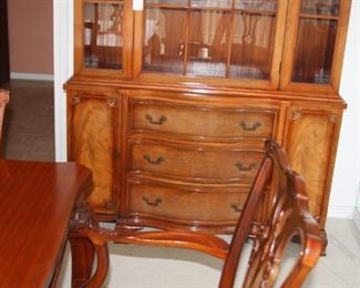 Beautiful fine quality Chippendale style  dining table with 8 chairs with buffet and china cabinet made by Andrew Malcolm - Dining table with 8 chairs and pads $1,750, Buffet $550, China cabinet $650. 