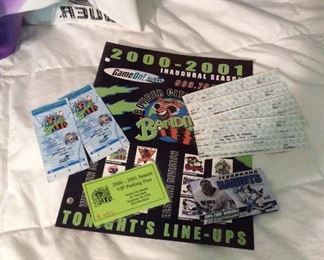 Border a City Bandits memorabilia with program, pass, and game tickets.