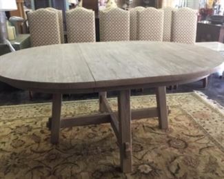 Pottery Barn Toscana extending table - still avail on PB website for retail of round table extends to oblong.  Retail $1299. 