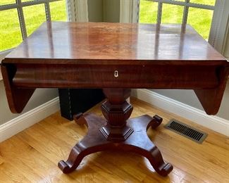 Item 49:  Antique Mahogany One Drawer Empire Table with Casters - 38.75"l x 26"w x 30.5"h: $375
