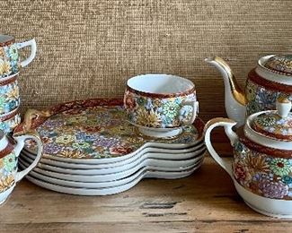 Item 77:  Kutani Ware Hand Painted Luncheon Set, Japan:    $115                                                                                              4 cups, 6 plates, sugar & creamer, teapot