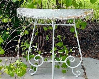 Item 277:  Small Vintage Metal Half Moon Table - 31.25"l x 16"w x 33.5"h: $42