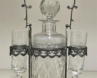 Item 372:  Antique Decanter Set in Silver Plate Stand: $95
