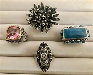 Item 394:  Sterling Silver Ring with Turquoise (perhaps): $75                                                                                
Item 395:  Sterling Silver Marcasite Flower Burst Ring: $58                                                                                                                   Item 396:  Ring with Pink Stone (likely sterling, not tested): $48                                                                                                            Item 397:  Marcasite Ring (likely sterling, not tested): 
$38