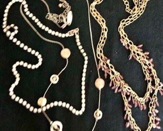 Item 441:  Rhinestone necklace: $14                                                                Item 442:  Circles Necklace: $12                                                                      Item 443:  Gold-tone necklace with purple stones: $14