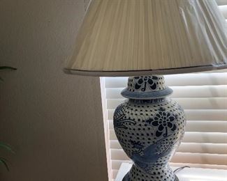 up close of one of  the painted blue and white lamps