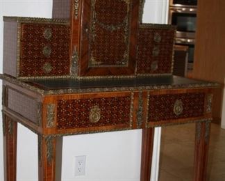 no. 135 Small inlaid writing desk w/storage compartments drawers green leather top - 37 1/2" t, 21 1/2" d, 54" t - $595 
