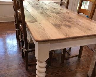 beautiful farmhouse table, white distressed base, natural wood plank top, 6 ladder back chairs with rush seats and thick white cushions - 2 arm, 4 side