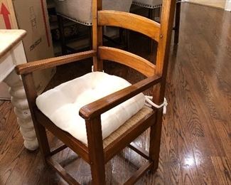 beautiful farmhouse table, white distressed base, natural wood plank top, 6 ladder back chairs with rush seats and thick white cushions - 2 arm, 4 side