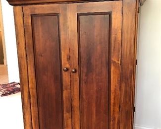 media armoire with folding doors