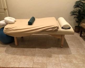 spa room massage table - adjustable height, face cradle, knee cushion, extra foam layer and all sheets to go with
