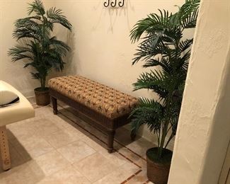bench and faux palms