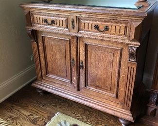 base of large antique glass front cabinet - great as a bar- next photo shows the top which attaches to this base