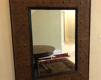 large metal tile framed wall mirror