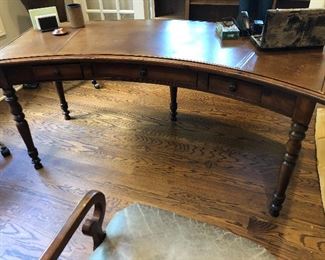 curved leather topped writing desk