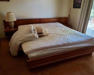 this bed has been taken apart and is available. King Size with floating end tables.