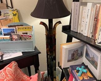 Modern floor lamp, lots of books