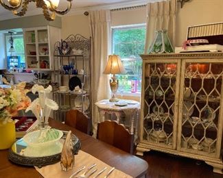 Looking back across the dining room. Lighted diamond glass front china cabinet