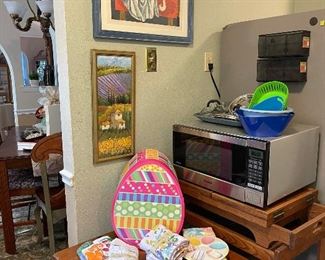 Microwave, art work, Easter  and kitchen linens