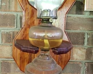 oil lamp , wooden holder