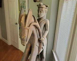 $475-African Horse and Rider Sculpture, 20th century.  Beautifully carved wood a true focal point in any room. Dimensions 7' Tall.