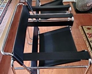$1,800-Pair of Marcel Breuer Wassily Chairs, imported from Italy around 2005.  High quality Italian black leather, in great condition.  Beautifully rendered replicas of Breuer’s 1925 design. The quality construction of these chairs far exceed was is commonly seen on the market today. Excellent like new condition 