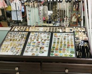 Jewelry &
Collector pins from Lions Club. 
1 case is Pennsylvania  & the other Iowa. 
You can purchase entire sets or individual pins.