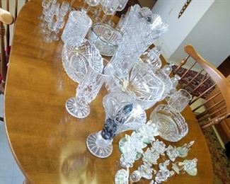 table full of Waterford, Swarovski & more crystal