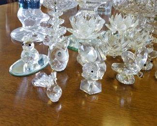 table full of Waterford, Swarovski & more crystal