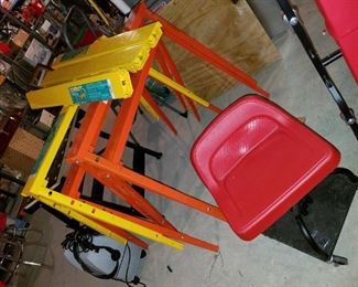 adjustable, collapsible, metal sawhorses.  7 of these, 5 never used