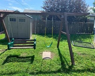 Swingset with swings. Must be disassembled to move