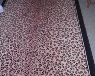 Black edged leopard floor rug  5 x 8