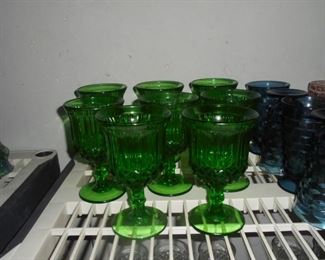 8 stemmed green  Fostoria glasses