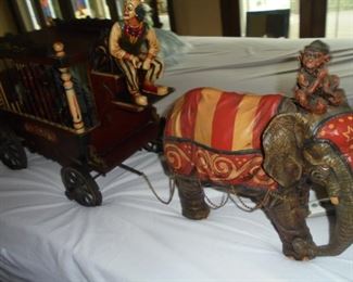 Circus tiger & bear cage wagon w/clown driver & elephant pulling wagon