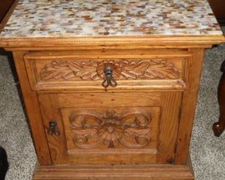 Matching carved wood table w/drawer & door