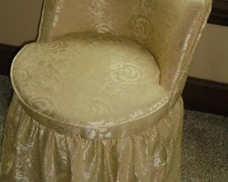 Gold swivel dressing chair w/skirt