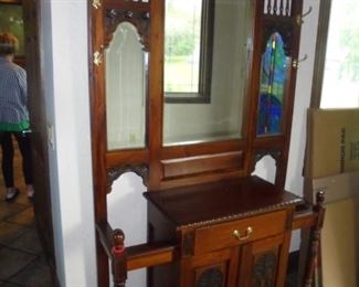 Solid carved wood w/3 mirrors & 2 umbrella holders w/brass coat hooks