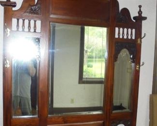 Solid carved wood w/3 mirrors & 2 umbrella holders w/brass coat hooks