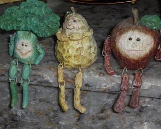 3 of 7 vegetable  figurines 