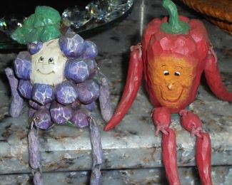 3 6 & 7  of 7 vegetable  figurines 